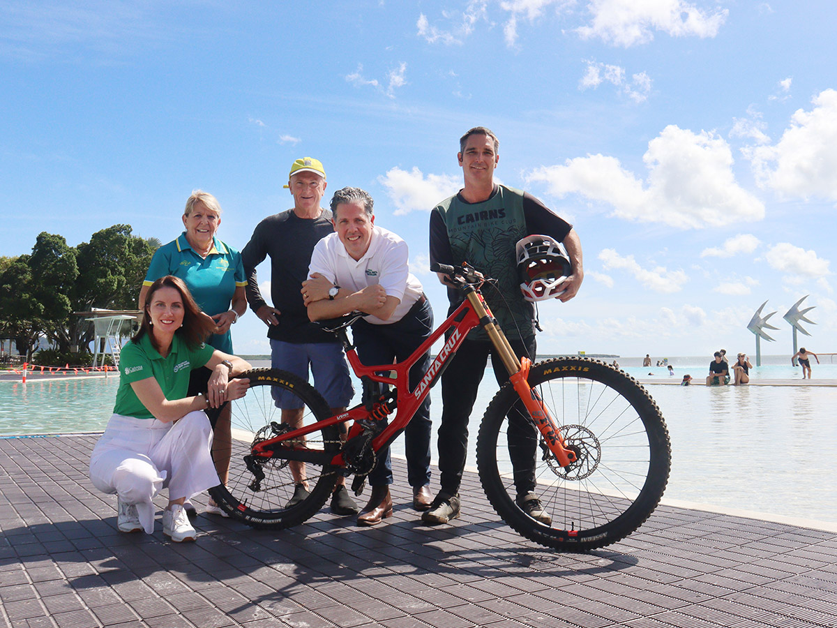 Cairns Mayor Amy Eden, Sharon Anderson from the over 65 Australian hockey team, swimmer Ted Bunt who is competing in the Great Barrier Reef Masters Games, TTNQ CEO Mark Olsen, and Nathan Weiss who is competing in the UCI Masters Mountain Bike World Championships.