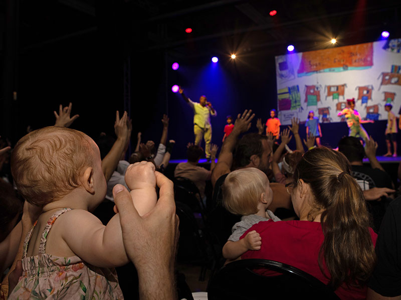 Baby watching a performance at Tanks Arts Centre
