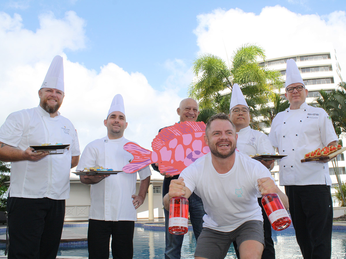Mayor Bob Manning (back, centre) at the launch of the Cocktail Party by the Pool event, with executive chefs (from back left) Aaron Habgood (Shangri-La), Trent Sydenham (Casino), Hyunjong Lee (Hilton), and Simon Capewell (Pullman International), with Sam Kennis (co-owner of Wolf Lane Distillery). 